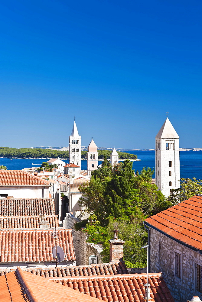 View towards the four bell towers of the town of Rab, Rab Island, Primorje-Gorski Kotar, Croatia, Europe