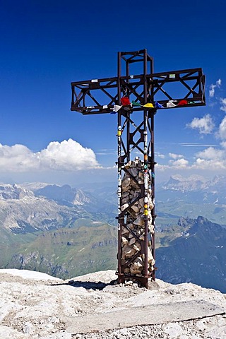 Summit cross of Marmolada mountain, Dolomites, Sella group, Heiligkreuzkofel group and Fedaia pass at the back, province of Trento, Italy, Europe