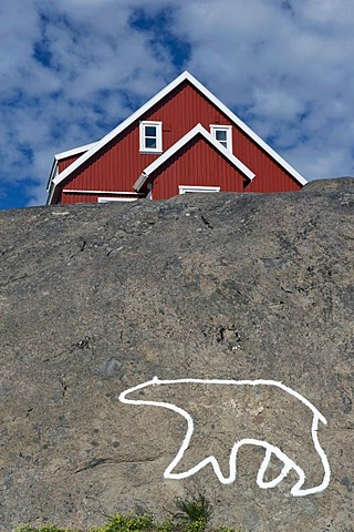 Red house and the outline of a polar bear, Nanook, Tasiilaq, also known as Ammassalik, East Greenland, Greenland