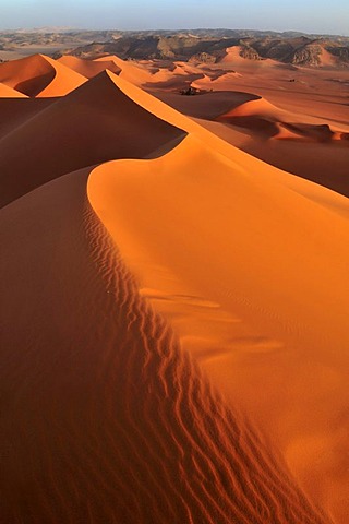 Red sanddune at Tin Merzouga, Acacus Mountains or Tadrart Acacus range, Tassili n'Ajjer National Park, Unesco World Heritage Site, Algeria, Sahara, North Africa