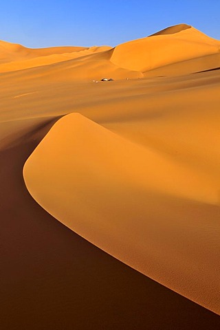 Tourist camp in the sand dunes of In Tehak, Tadrart, Tassili n'Ajjer National Park, Unesco World Heritage Site, Algeria, Sahara, North Africa