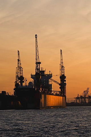 Ship in a dock, evening mood, port of Hamburg, Elbe river, Hamburg, Germany, Europe