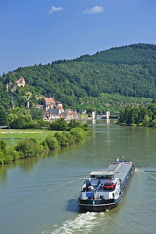 Townscape with the Neckar river and a cargo ship, Hirschhorn, Neckartal Odenwald Nature Park, Hesse, Germany, Europe