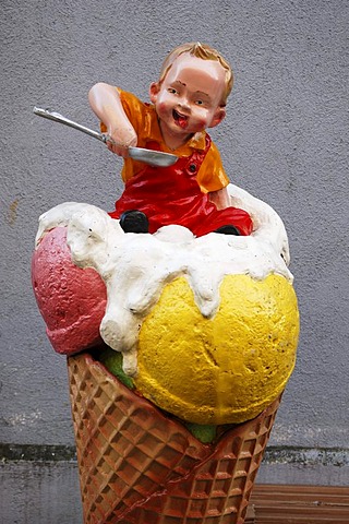 Advertising character from an ice cream parlor, a small child sitting in an ice cream cone, Wasserburg am Inn, Bavaria, Germany, Europe