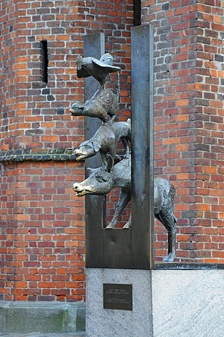 Statue of the Town Musicians of Bremen beside St. Peter's Church, Riga, historic town centre, Latvia, Baltic States, Northern Europe