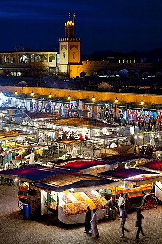 Food and market stalls in Djemaa El Fna square at night, medina or old town, UNESCO World Heritage Site, Marrakech, Morocco, Africa