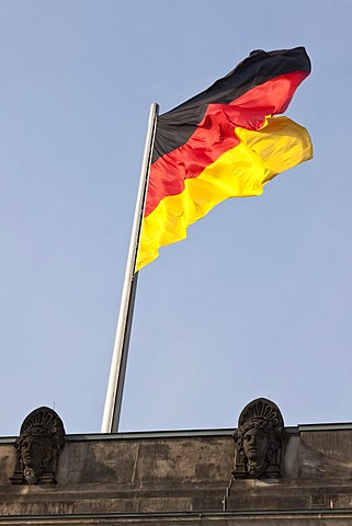 Flag of Germany flying over the Reichstag building, Berlin, Germany, Europe