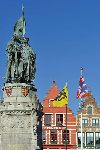 Statue of Jan Breydel and Pieter de Coninck, folk heroes, on the market square Grote Markt, in the historic centre of Bruges, Flanders, Belgium, Europe