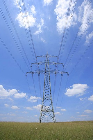 Power poles, transmission line, field, blue sky, Wipperfuerth, North Rhine-Westphalia, Germany, Europe