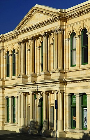 The facade of a typical limestone building in downtown Oamaru, South Island, New Zealand
