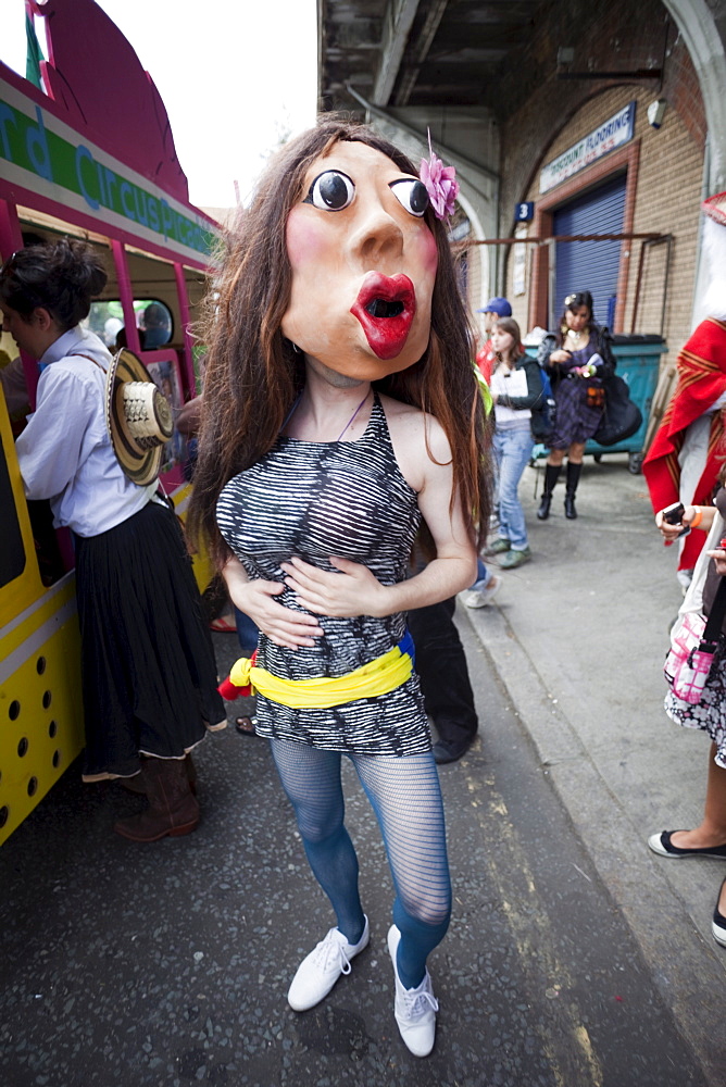 Masked participant in the Carnaval Del Pueblo Festival, Europes largest Latin Street Festival, Southwark, England, United Kingdom, Europe