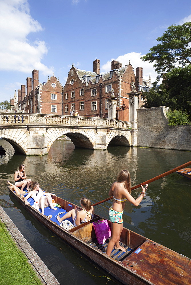 Punting on River Cam with St. John's College in the background, Cambridge, Cambridgeshire, England, United Kingdom, Europe