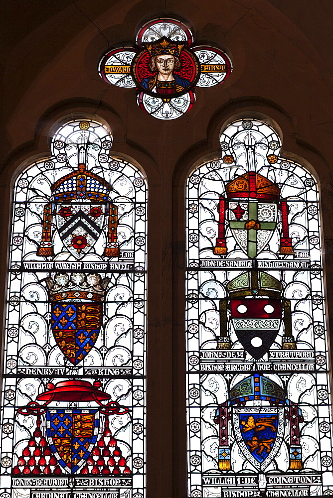 Stained glass window depicting coats of arms, The Great Hall, Winchester, Hampshire, England, United Kingdom, Europe