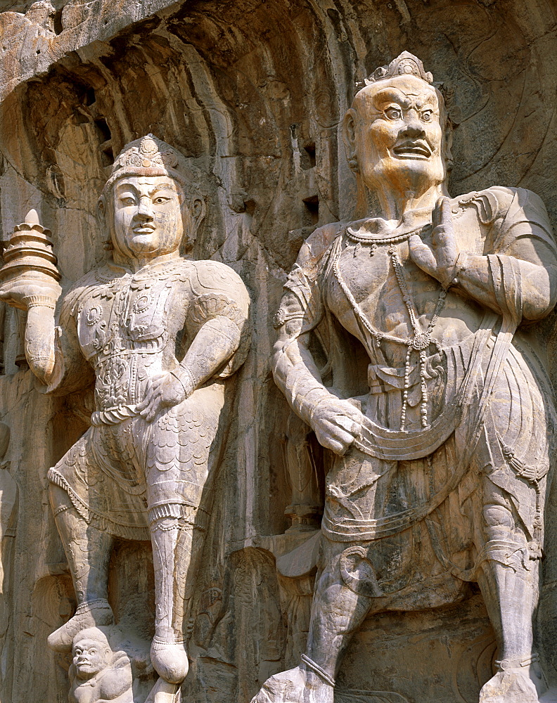 Bodhisattva and Guardian statues, Longmen Buddhist Caves, Ancestor Worshipping Temple dating from the Tang Dynasty, UNESCO World Heritage Site, Luoyang, Henan Province, China, Asia