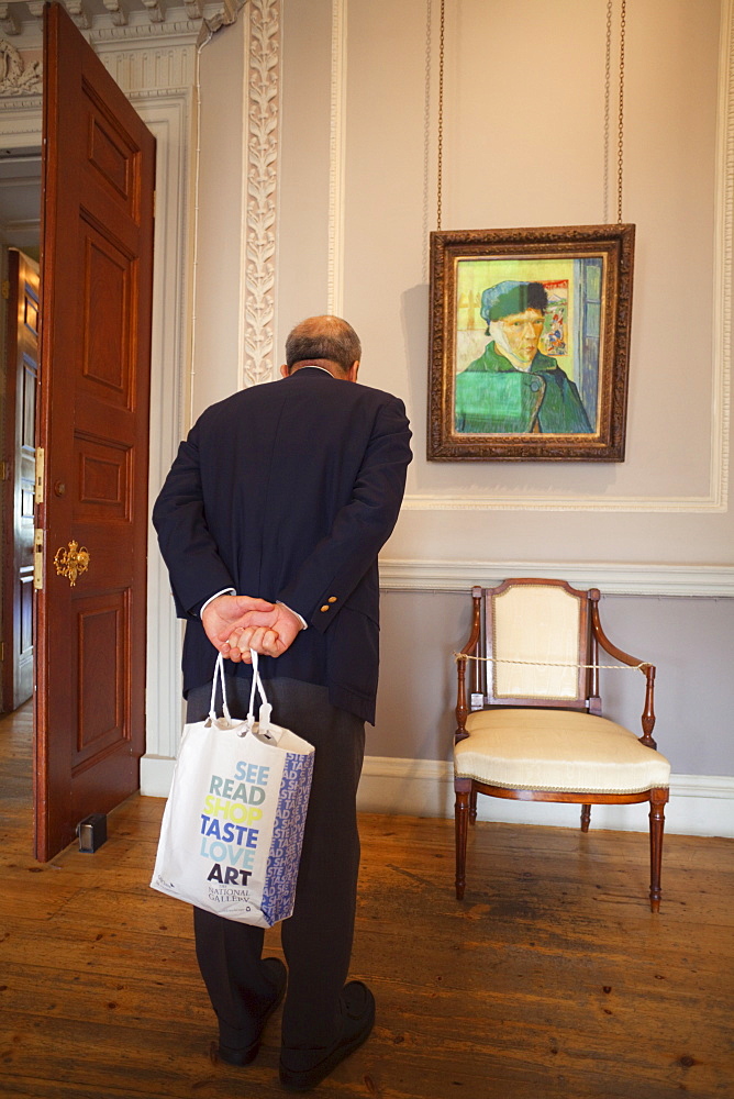 Tourist in the Courtauld Gallery, Somerset House, London, England, United Kingdom, Europe