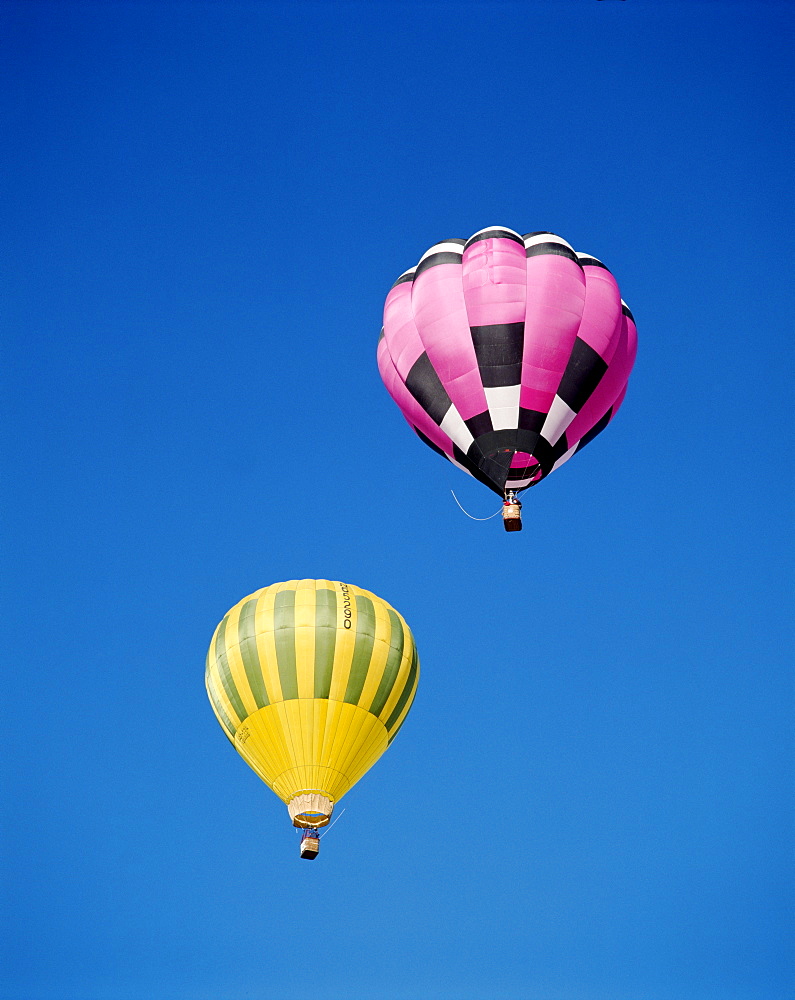 Colourful hot air balloons in blue sky, Albuquerque, New Mexico, United States of America, North America