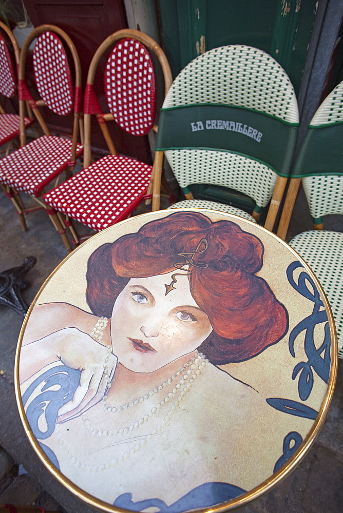 Detail of table and chairs at an outdoor cafe, Montmartre, Paris, France, Europe