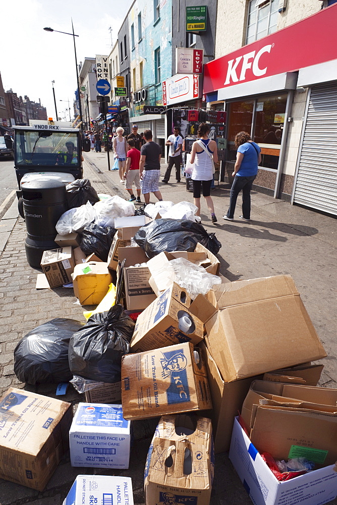 Rubbish awaiting collection on pavement, London, England, United Kingdom, Europe