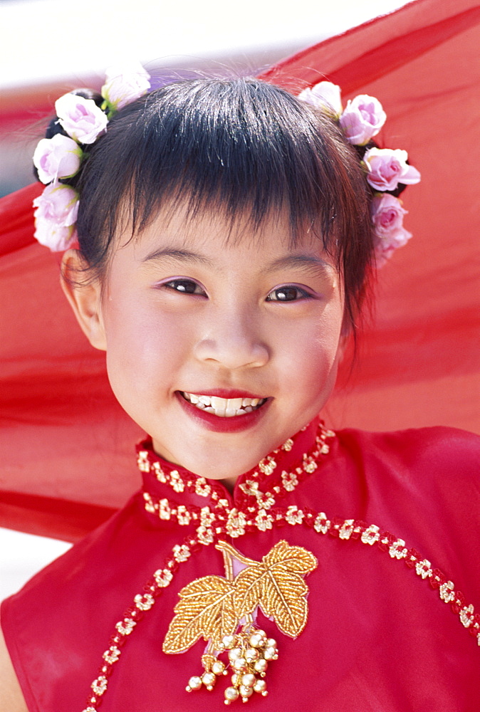 Young girl in traditional Chinese dress (Cheongsam), Beijing, China, Asia