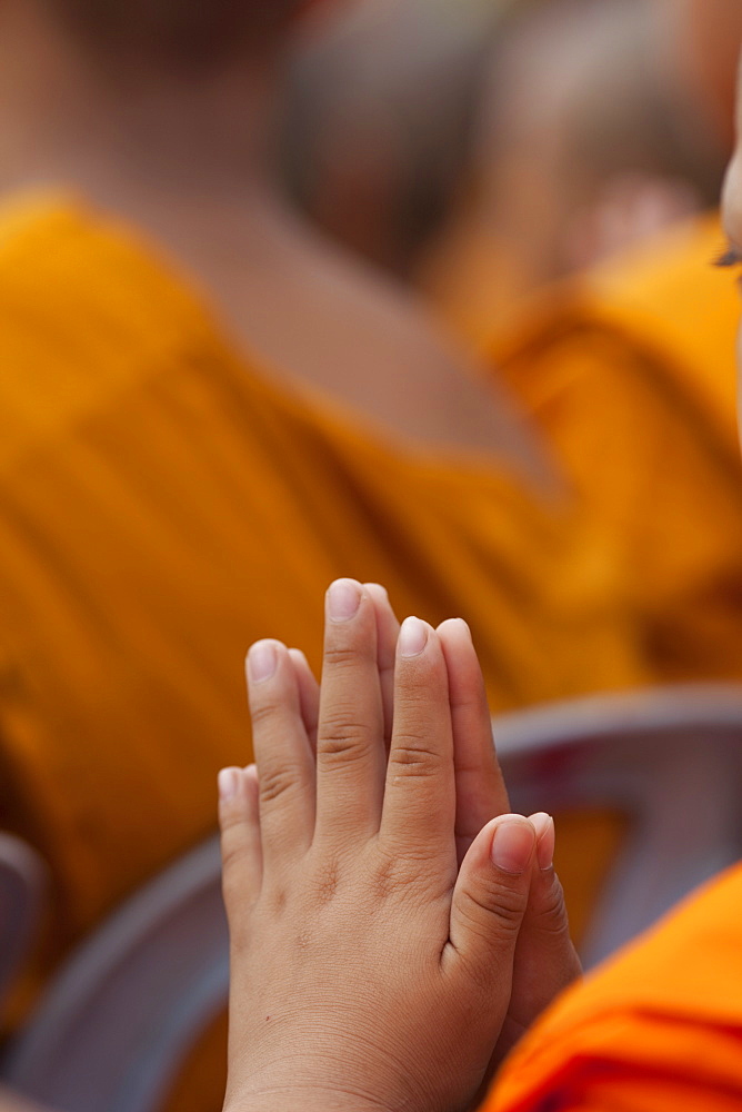 Hands of young monk praying, Ayutthaya Historical Park, Ayutthaya, Thailand, Southeast Asia, Asia