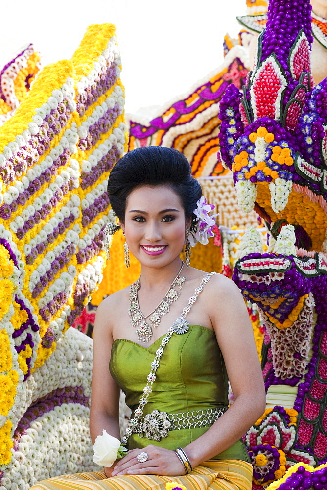 Young woman on floral float, Chiang Mai Flower Festival Chiang Mai, Thailand, Southeast Asia, Asia