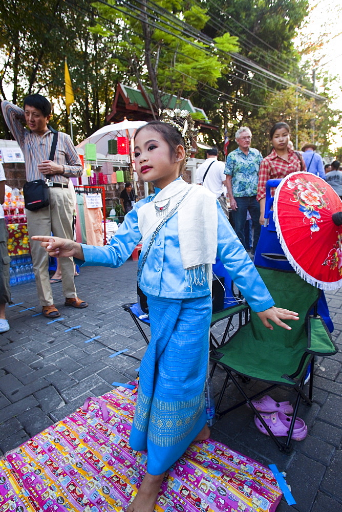 Young street performer, Sunday Street Market, Chiang Mai, Thailand, Southeast Asia, Asia