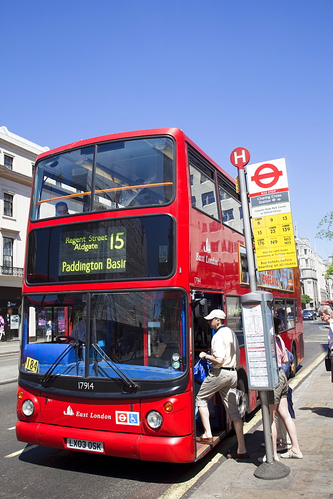 Passengers boarding double decker bus, London, England, United Kingdom, Europe