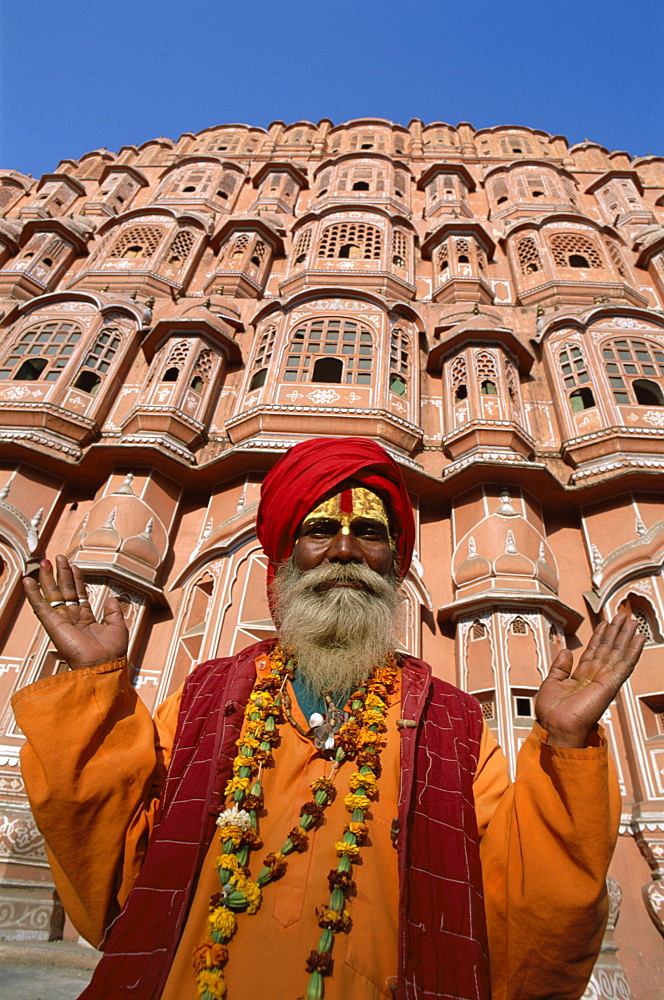 Sadhu outside the Palace of the Winds (Hawa Mahal), Jaipur, Rajasthan, India, Asia