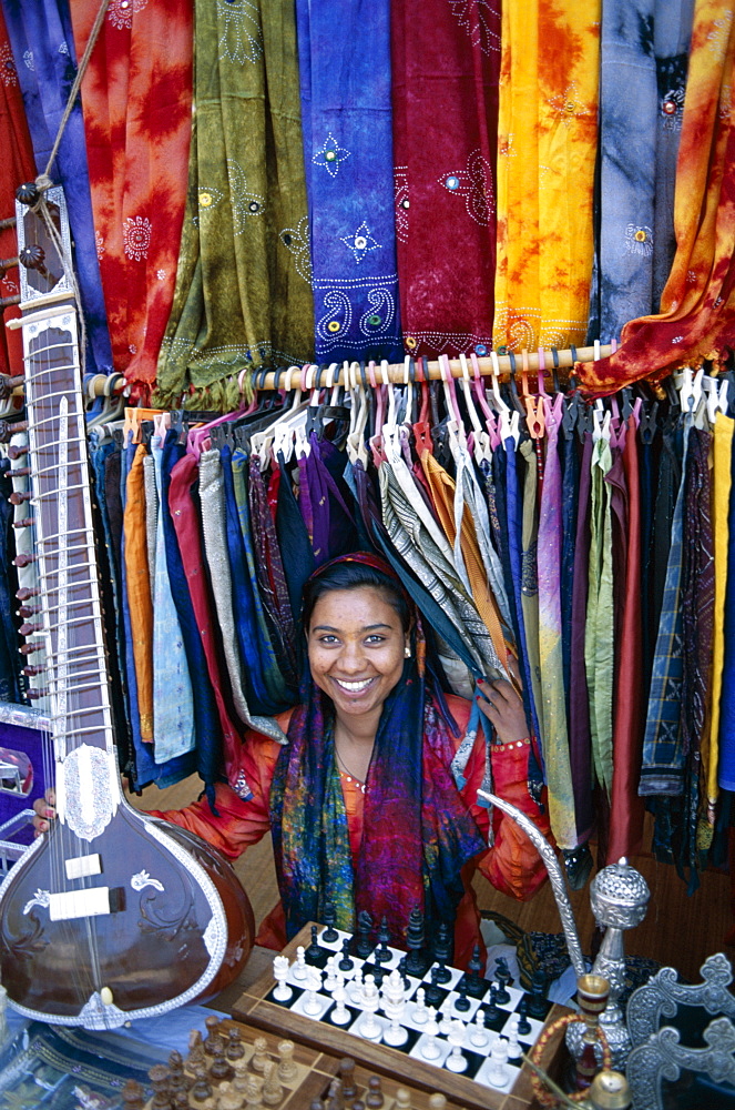 Vendor selling batiks and local crafts, Anjuna Market, Goa, India, Asia