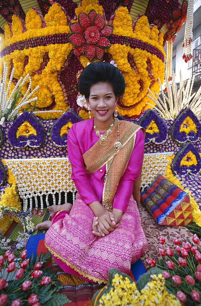 Woman dressed in traditional costume on a floral float, Flower Festival, Chiang Mai, Thailand, Southeast Asia, Asia