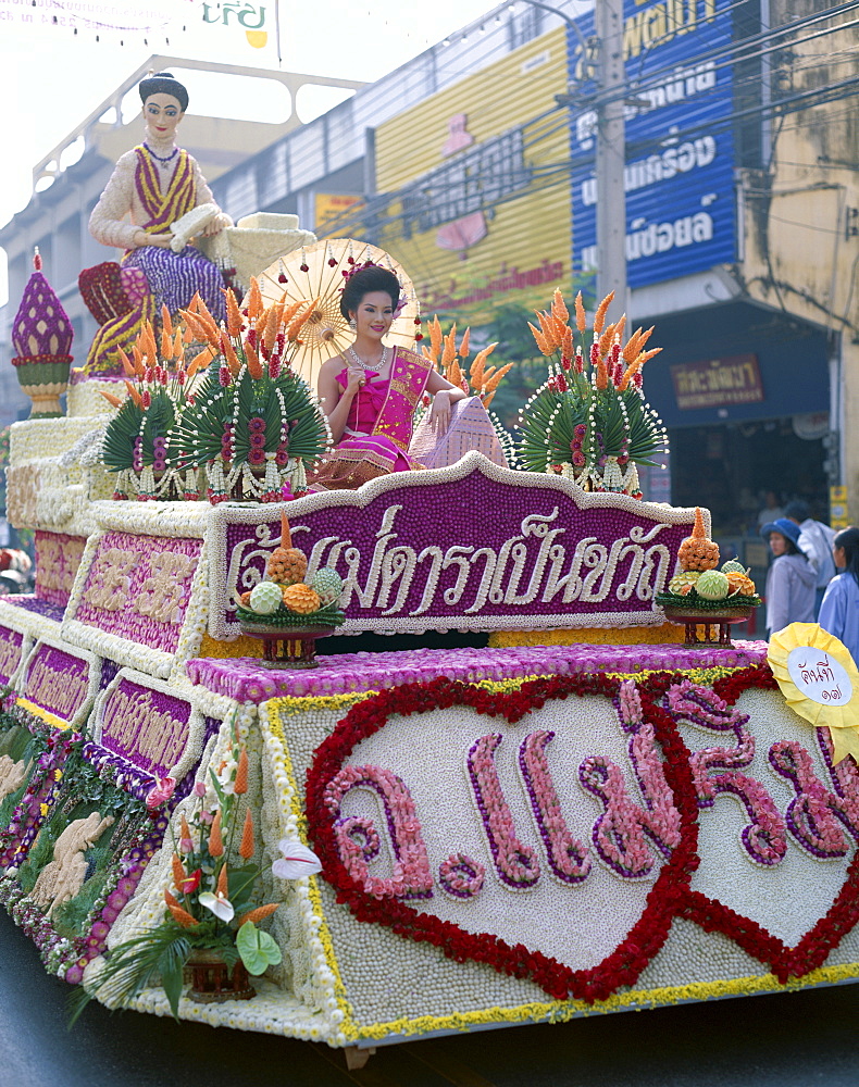 Woman dressed in traditional costume on a floral float, Flower Festival, Chiang Mai, Thailand, Southeast Asia, Asia