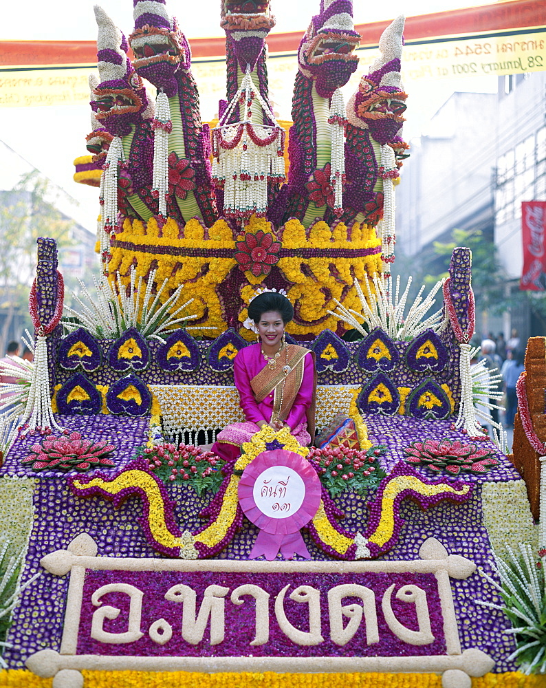 Woman dressed in traditional costume on a floral float, Flower Festival, Chiang Mai, Thailand, Southeast Asia, Asia