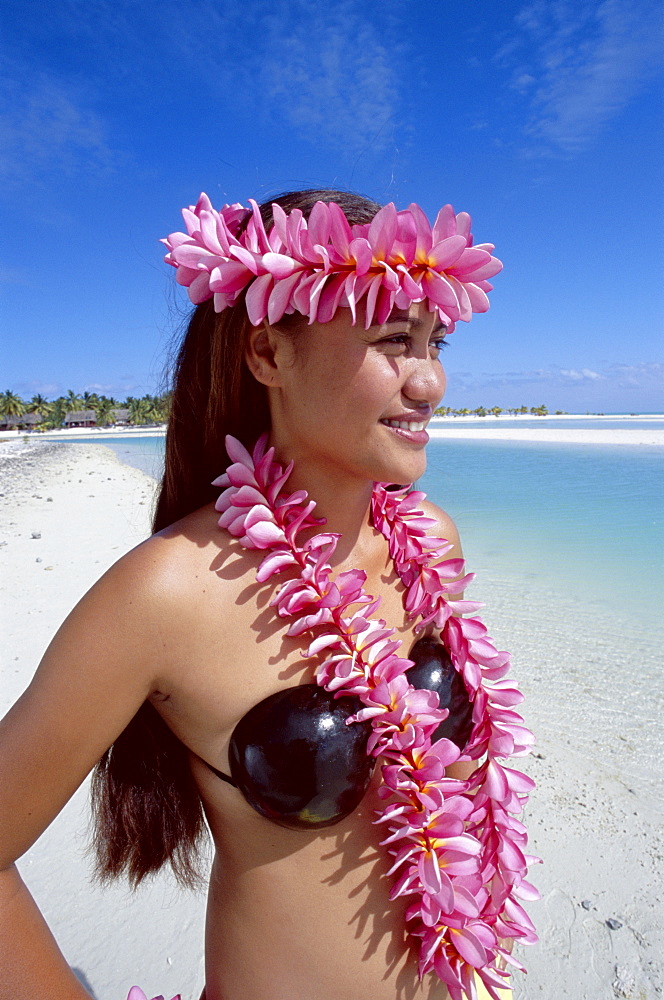 Polynesian girl dressed in traditional costume with leis (flower garlands), Aitutaki, Cook Islands, Polynesia, South Pacific, Pacific