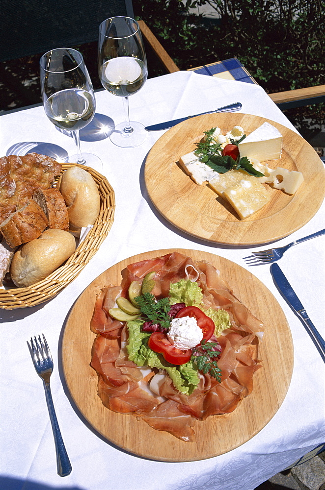 Regional cuisine of cured ham (speck) and cheese, Villnoss, Val di Funes, Trentino, Italy, Europe