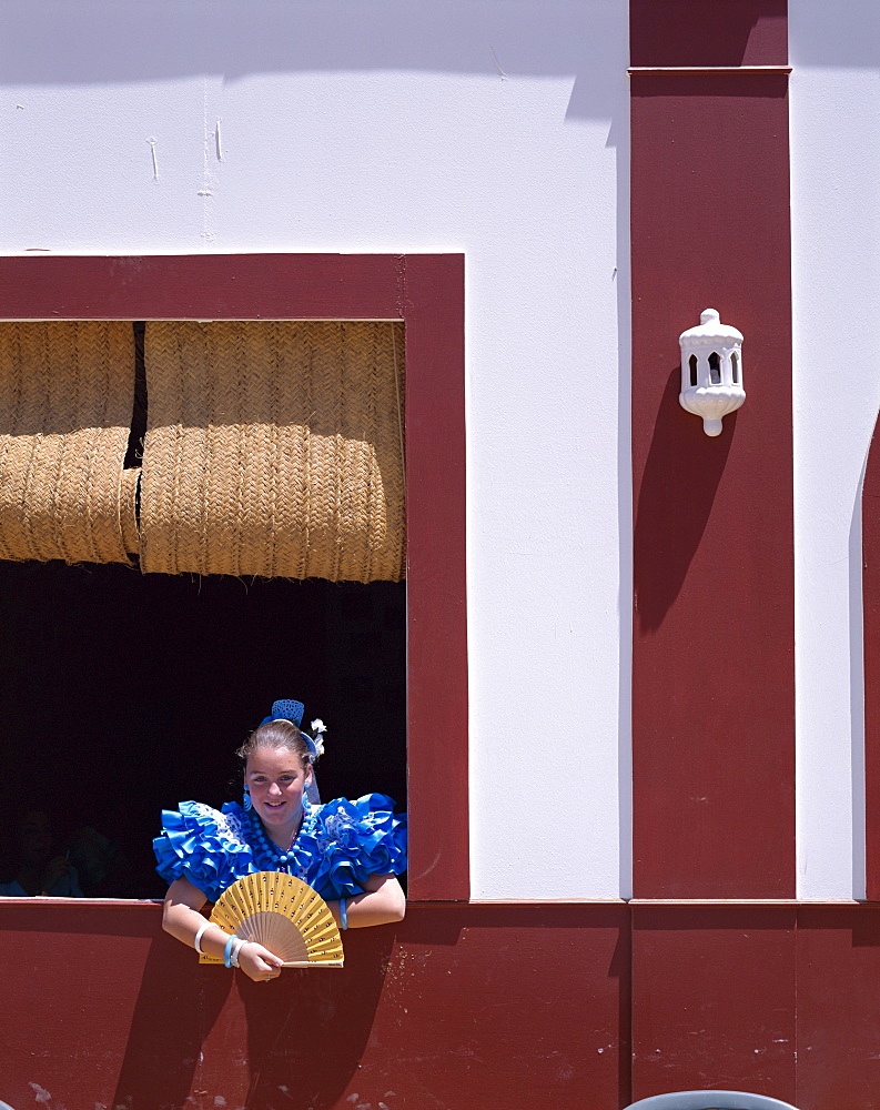 Girl dressed in Andalucian costume at the Horse Fair (Fiesta), Jerez de la Frontera, Andalusia, Spain, Europe