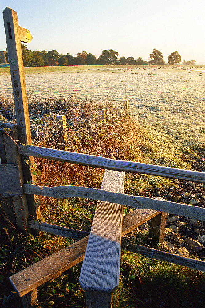 Frost on stile and footpath sign, England, United Kingdom, Europe