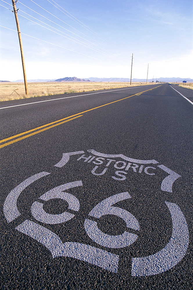 Route 66 sign on empty Road, Historic Route 66 Highway, Seligman, Arizona, United States of America, North America