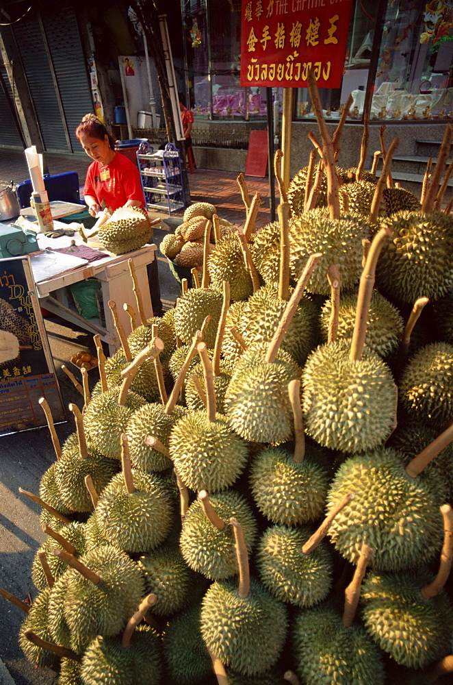 Woman street vendor selling durians, Bangkok, Thailand, Southeast Asia, Asia