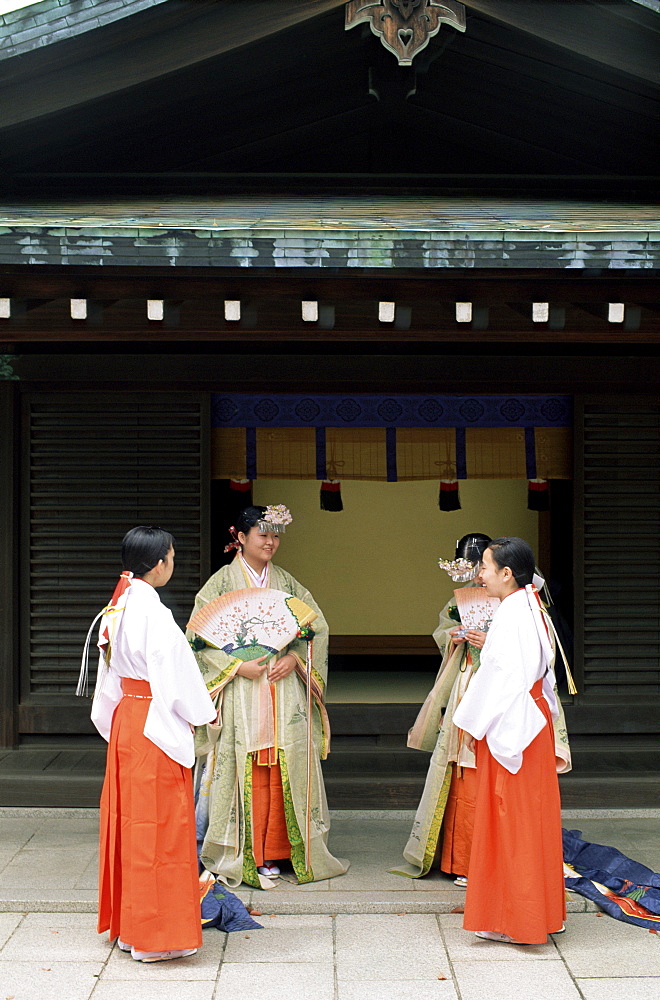 Shrine maidens dressed in traditional costume, Meiji Jingu Spring Grand Festival Celebration, Meiji Jingu Shrine, Tokyo, Japan, Asia