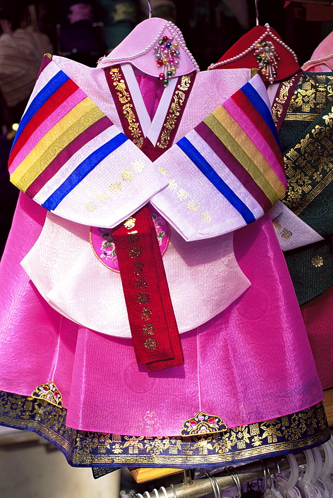 Young girl's national costume on display, Namdaemun Market, Seoul, South Korea, Asia