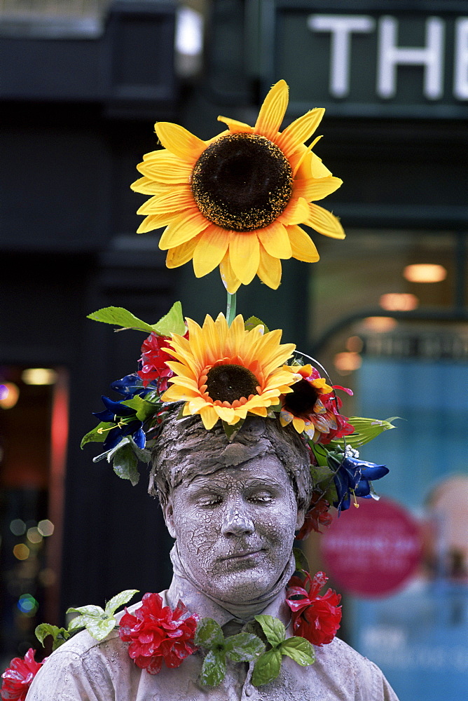 Human statue street performer, Covent Garden, London, England, United Kingdom, Europe