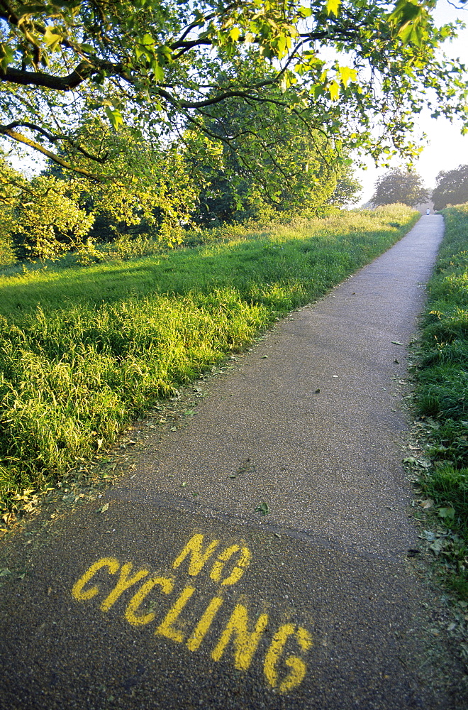 No Cycling sign on footpath on Hampstead Heath, Hampstead, London, England, United Kingdom, Europe