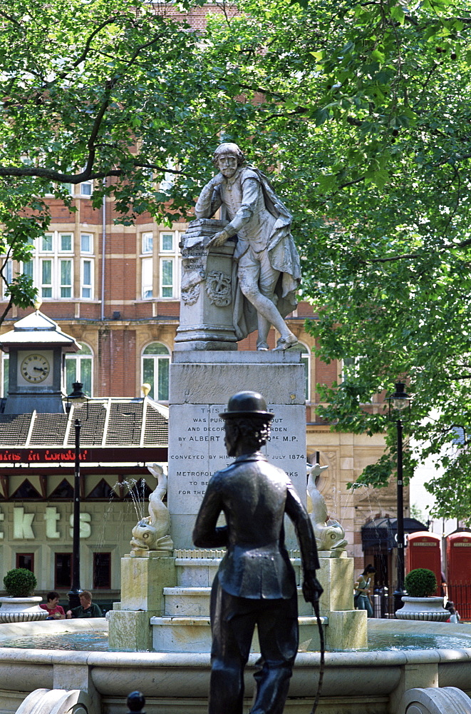 Charlie Chaplin statue and Shakespeare statue, Leicester Square, London, England, United Kingdom, Europe