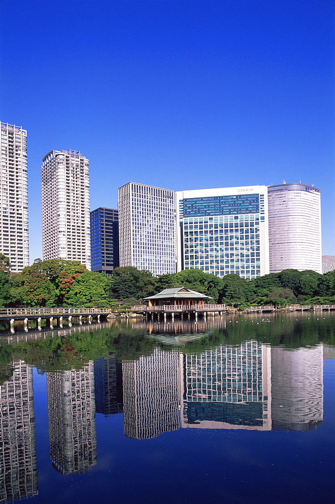 Hama Rikyu Japanese Garden and Shiodome area skyline, Tokyo, Japan, Asia