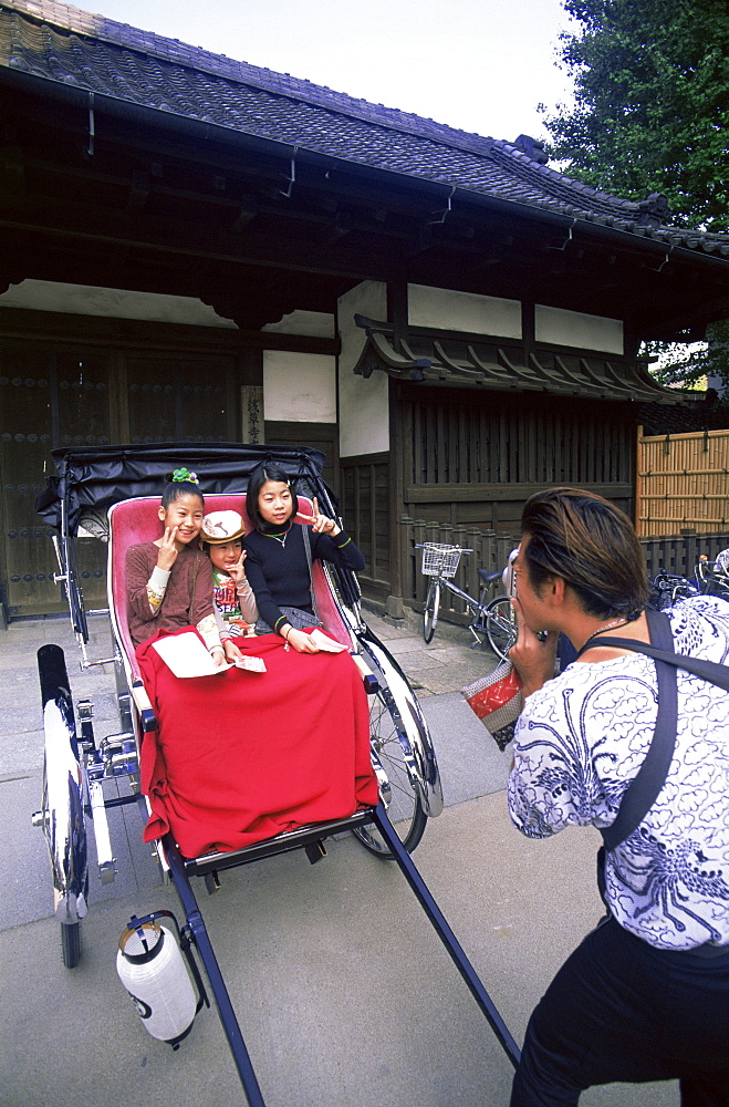 Children in rickshaw, Asakusa, Tokyo, Japan, Asia