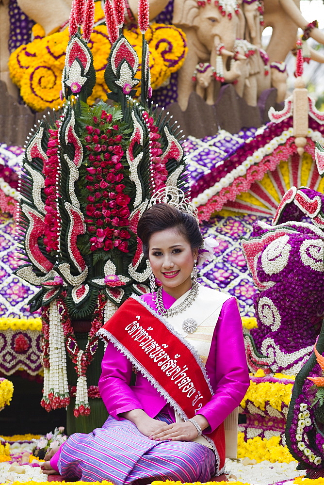 Girl on floral float at Chiang Mai Flower Festival Parade, Chiang Mai, Thailand, Southeast Asia, Asia