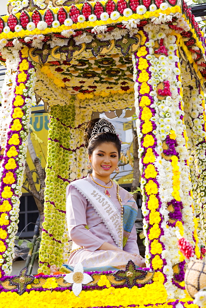 Girl on floral float at Chiang Mai Flower Festival Parade, Chiang Mai, Thailand, Southeast Asia, Asia