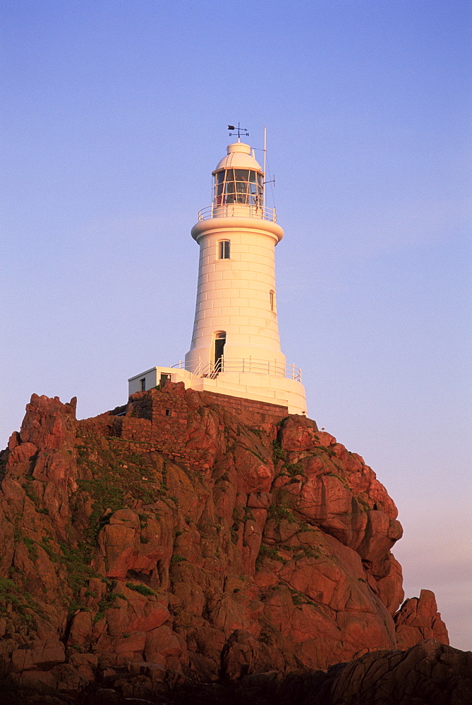 La Corbiere Lighthouse at dawn, Jersey, Channel Islands, United Kingdom, Europe