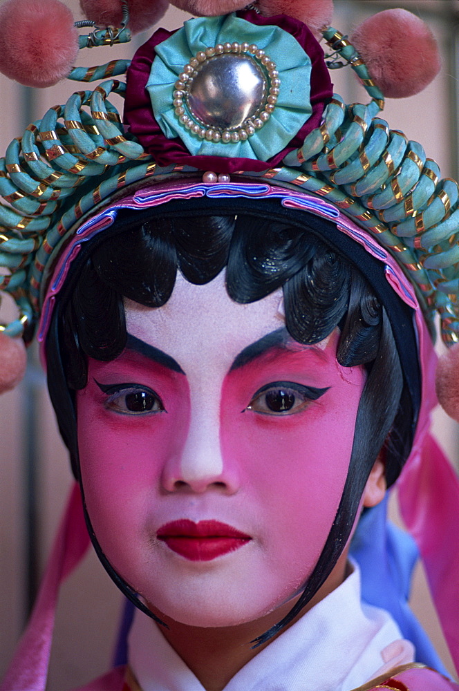 Portrait of boy dressed in Chinese Opera costume, Hong Kong, China, Asia