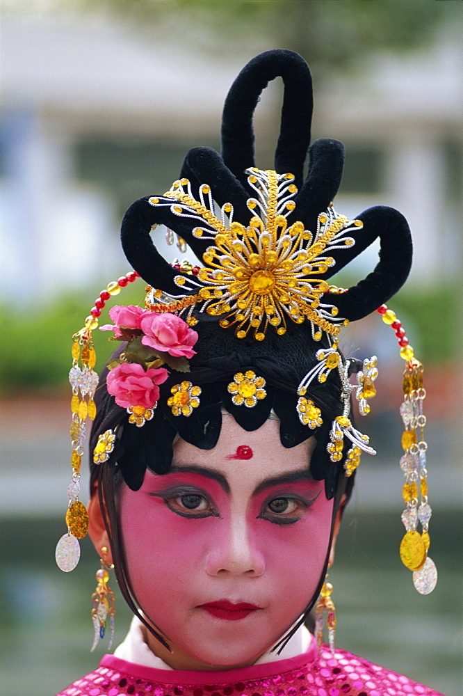 Portrait of child dressed in Chinese Opera costume, Hong Kong, China, Asia